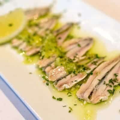 Alici marinate con agrumi e zenzero, antipasto di pesce, ricette di pesce.