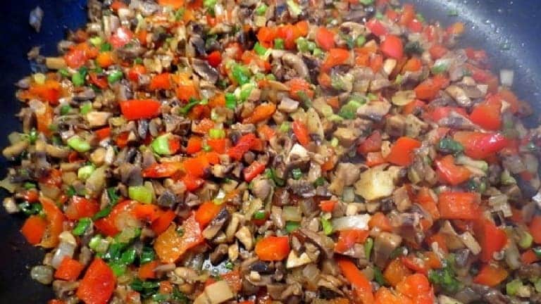 Sauté vegetables: onions, clean mushrooms, peppers, shallots. Stuffing