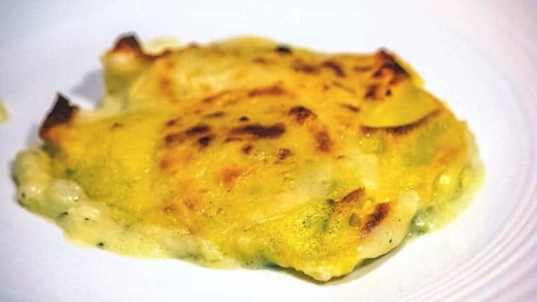 Crespelle al forno con carciofi, besciamella e formaggio Montasio: un primo piatto da urlo!