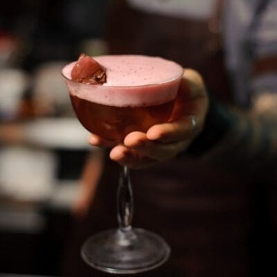 Bloody Santina, Christmas cocktail with mezcal, bitter, raspberries and rhubarb