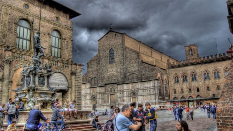 Bologna square with San Petronio and Neptune's Statue and fountain