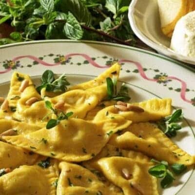 Ravioli stuffed with goat's cheese, pears, aromatic herbs, and toasted pine nuts