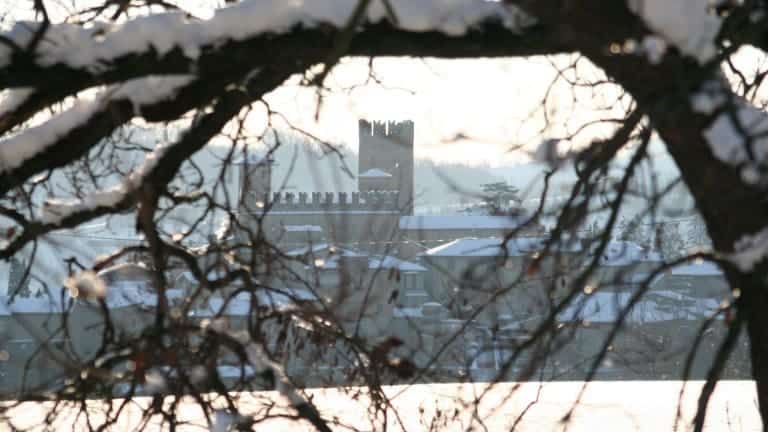 Castell'Arquato village, medieval village among the vineyards. Snow in the vines