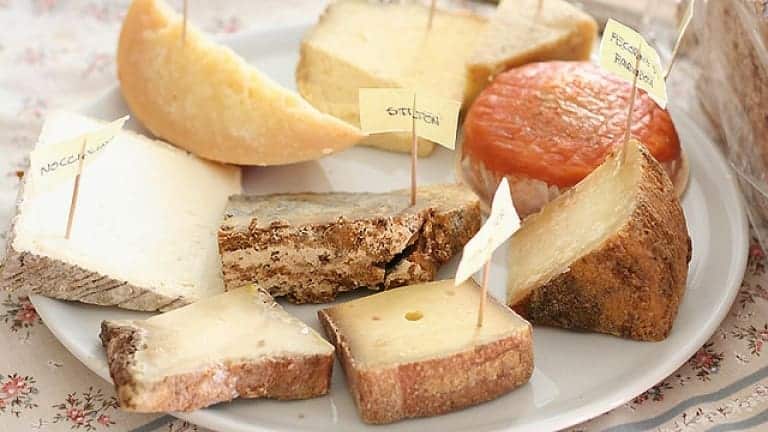 Plate of cheeses. What should you pair to aged cheeses? Brandy of course!