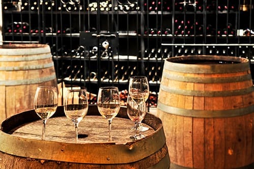 Wine cellar filled with barrels.jpg