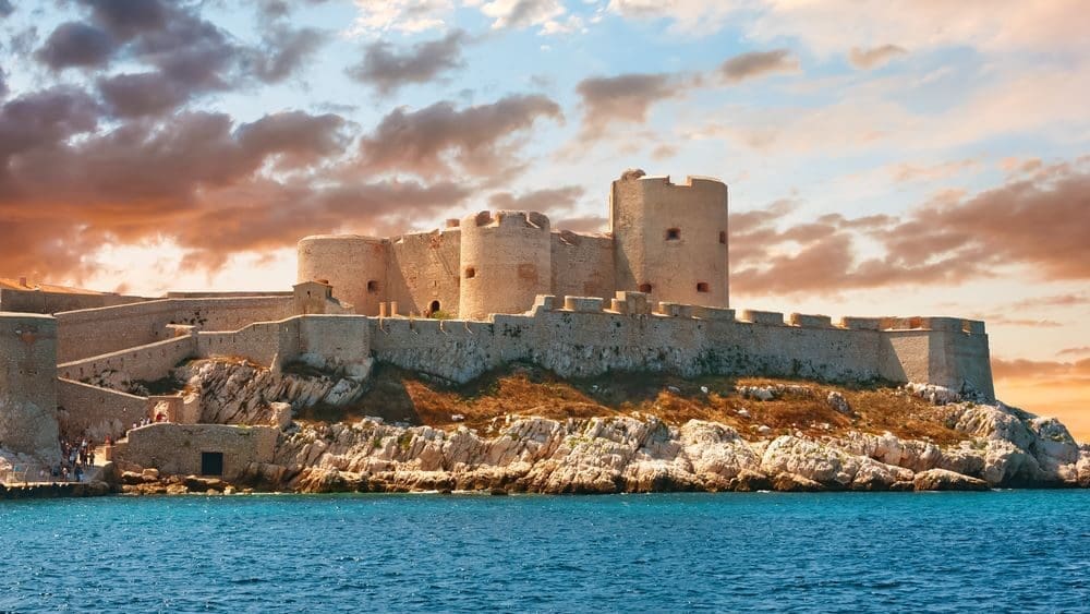 Mesmerizing view of Chateau d'If, an enchanting fortress rising from the turquoise waters of Marseille