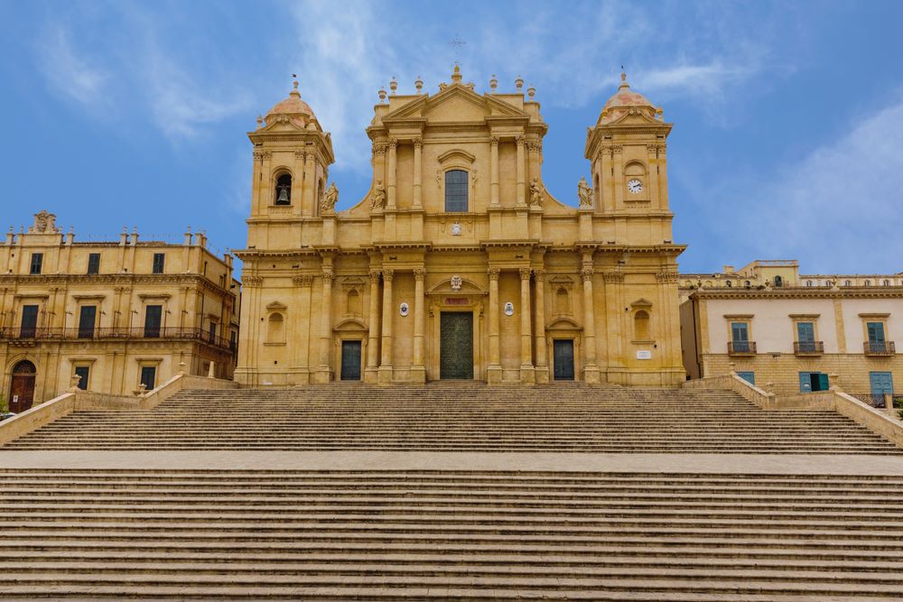 Noto, Modica, Caltagirone, Militello Val di Catania, Palazzolo Acreide, and Scicli, it forms part of the “late Baroque cities of the Val di Noto,” recognized by UNESCO as a testament to the art and architecture of that specific genre