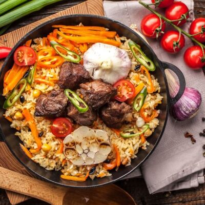 Plov Uzbeko: Ricetta, Segreti e Storie del Piatto Simbolo della Via della Seta